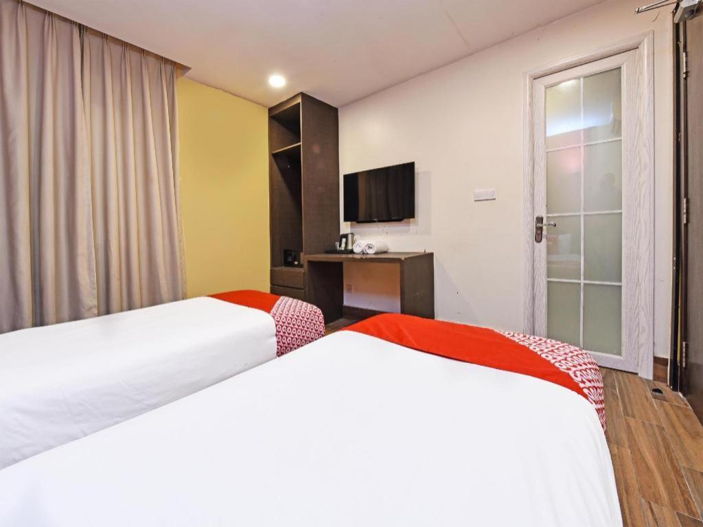 Capital O 90574 Hotel Glo Куала Лумпур Екстериор снимка