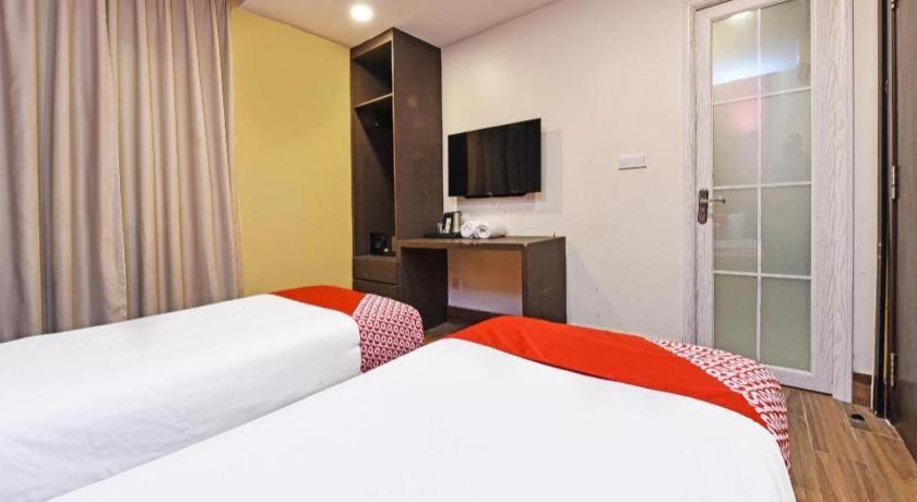 Capital O 90574 Hotel Glo Куала Лумпур Екстериор снимка